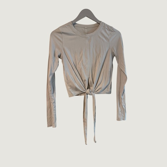 lululemon athletica Tops - Lululemon It's A Tie Long Sleeve‎ Crop Top Light Grey Size 4 Activewear